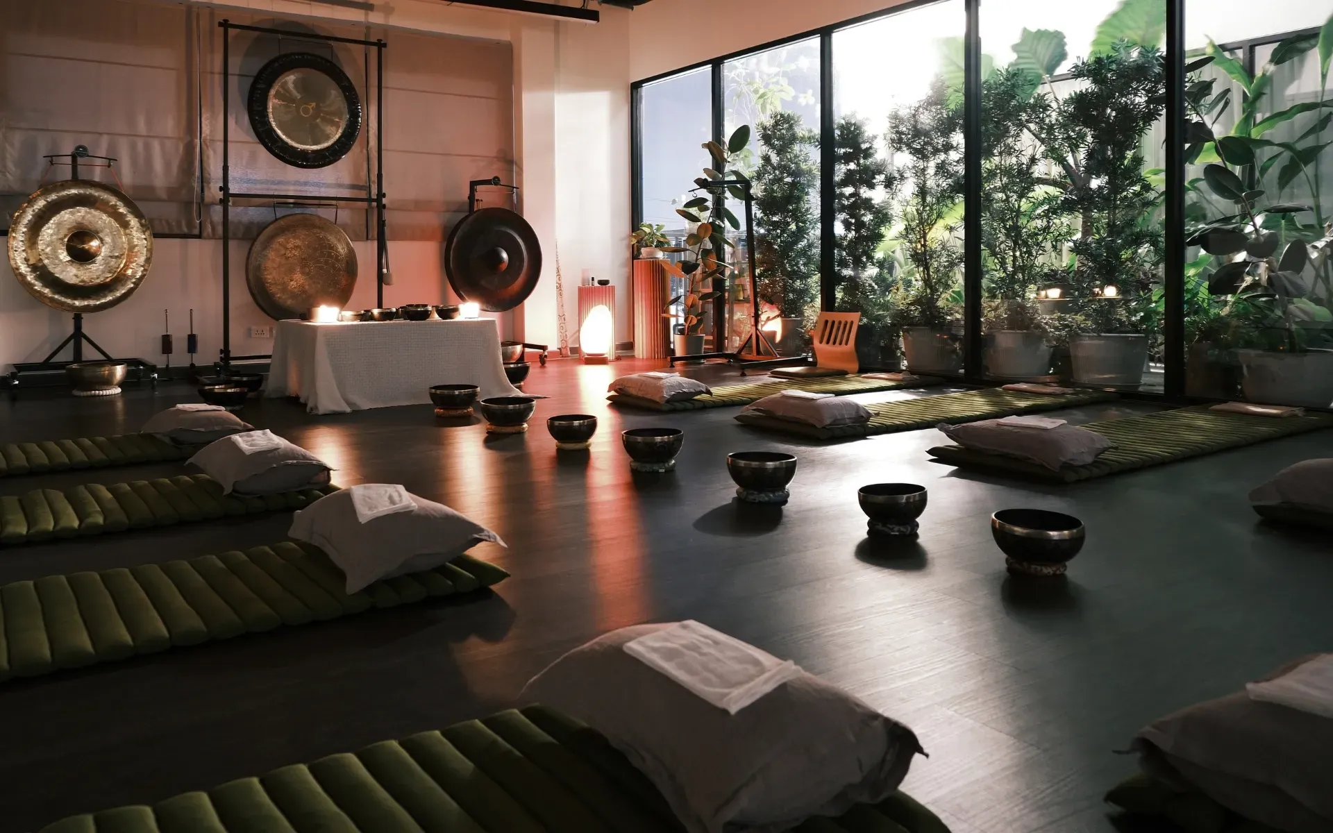 A group sound bath session at Attuned Studio in Bangkok.