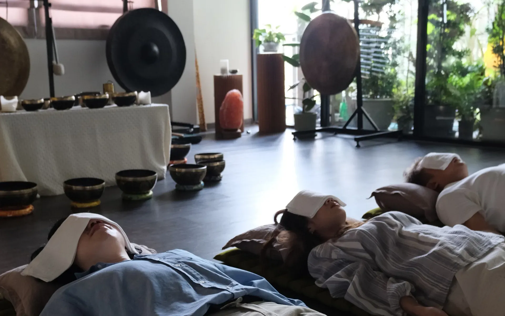 A private group sound bath session at Attuned Studio in Bangkok.