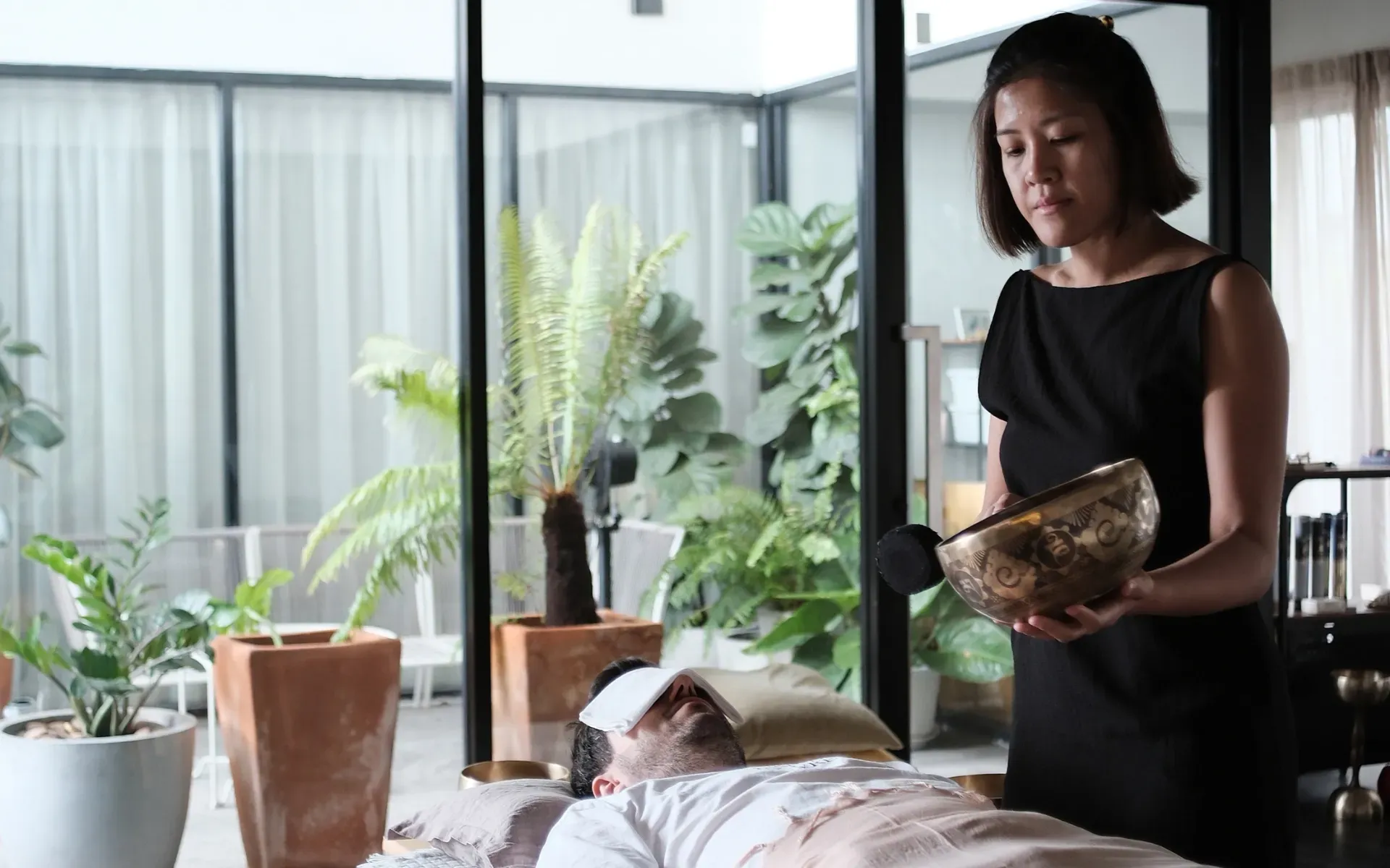 An advanced sound healing training session at Attuned Studio in Bangkok.